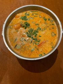 Famous Tom-yum Shrimp soup with coconut milk and thai herbs No. 85 on our menu